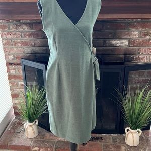 Green sleeveless dress.